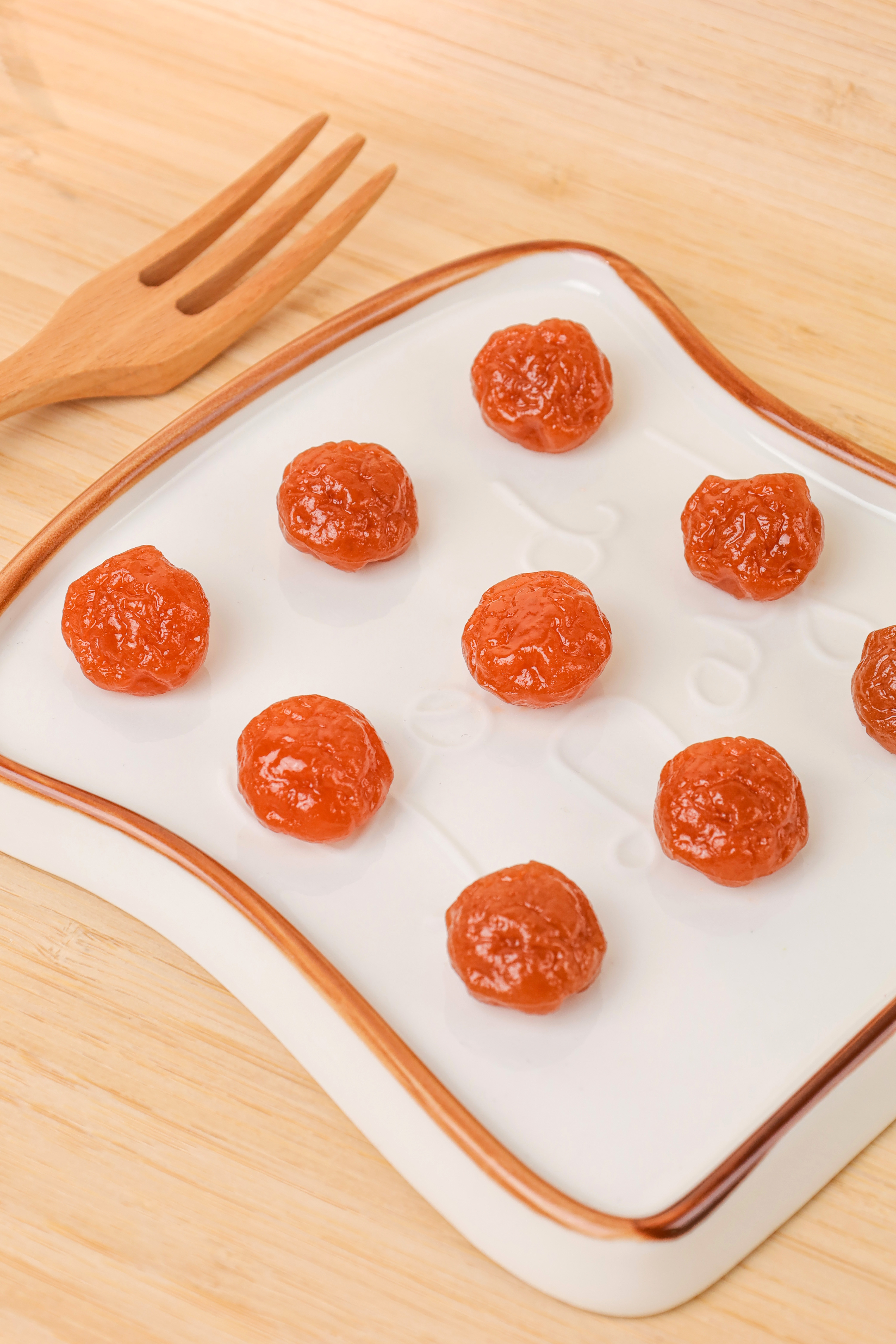 Close-up of AGOLYN Dried Plum Candy Showing Glossy Texture and Quality